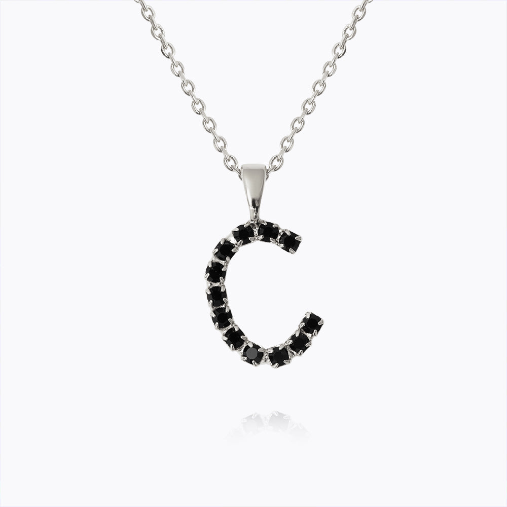Caroline Svedbom - Mini Letter Black Necklace Letter C Rhodium