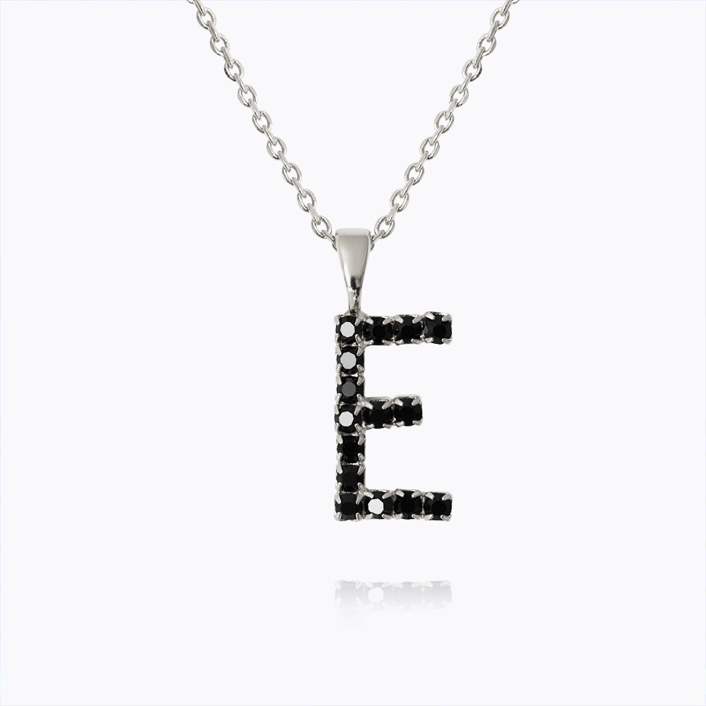 Caroline Svedbom - Mini Letter Black Necklace Letter E Rhodium